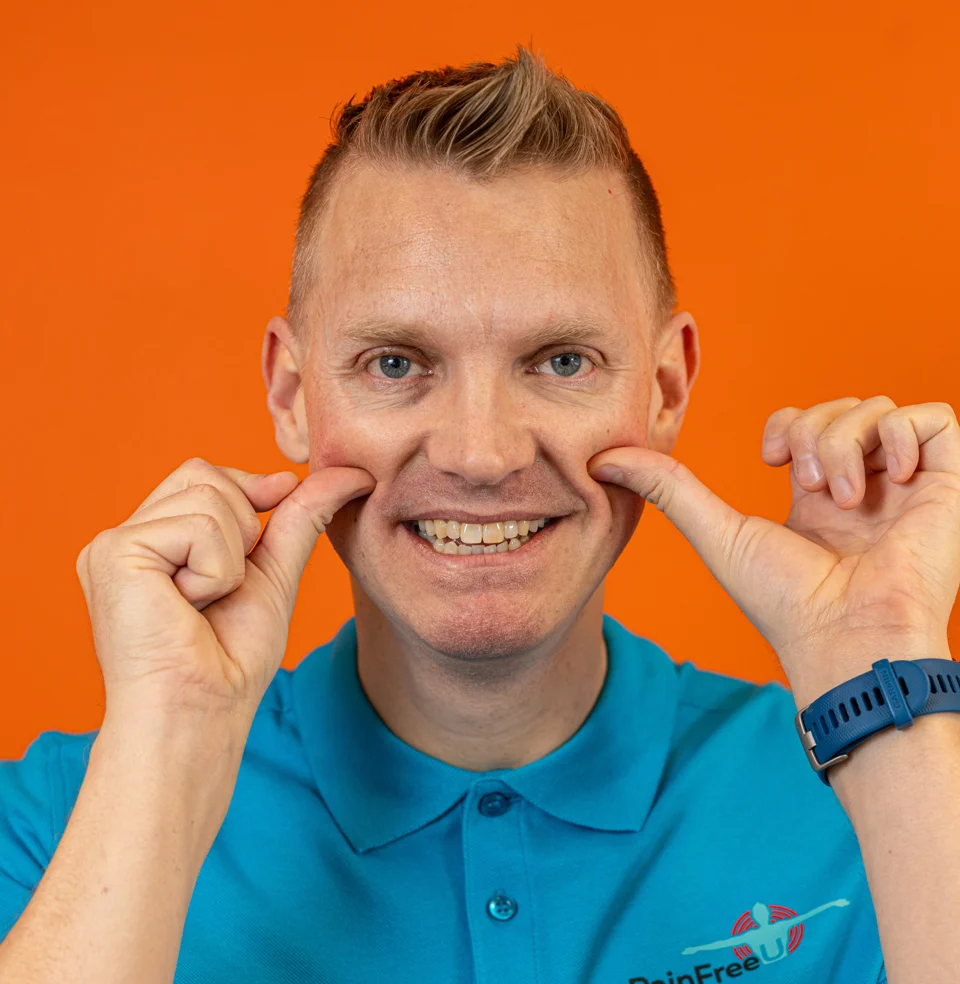 Rune Åbø demonstrating hand placement beside his nose for his sinus massage technique